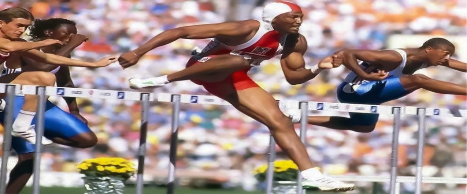 Roger Kingdom competing in the hurdles